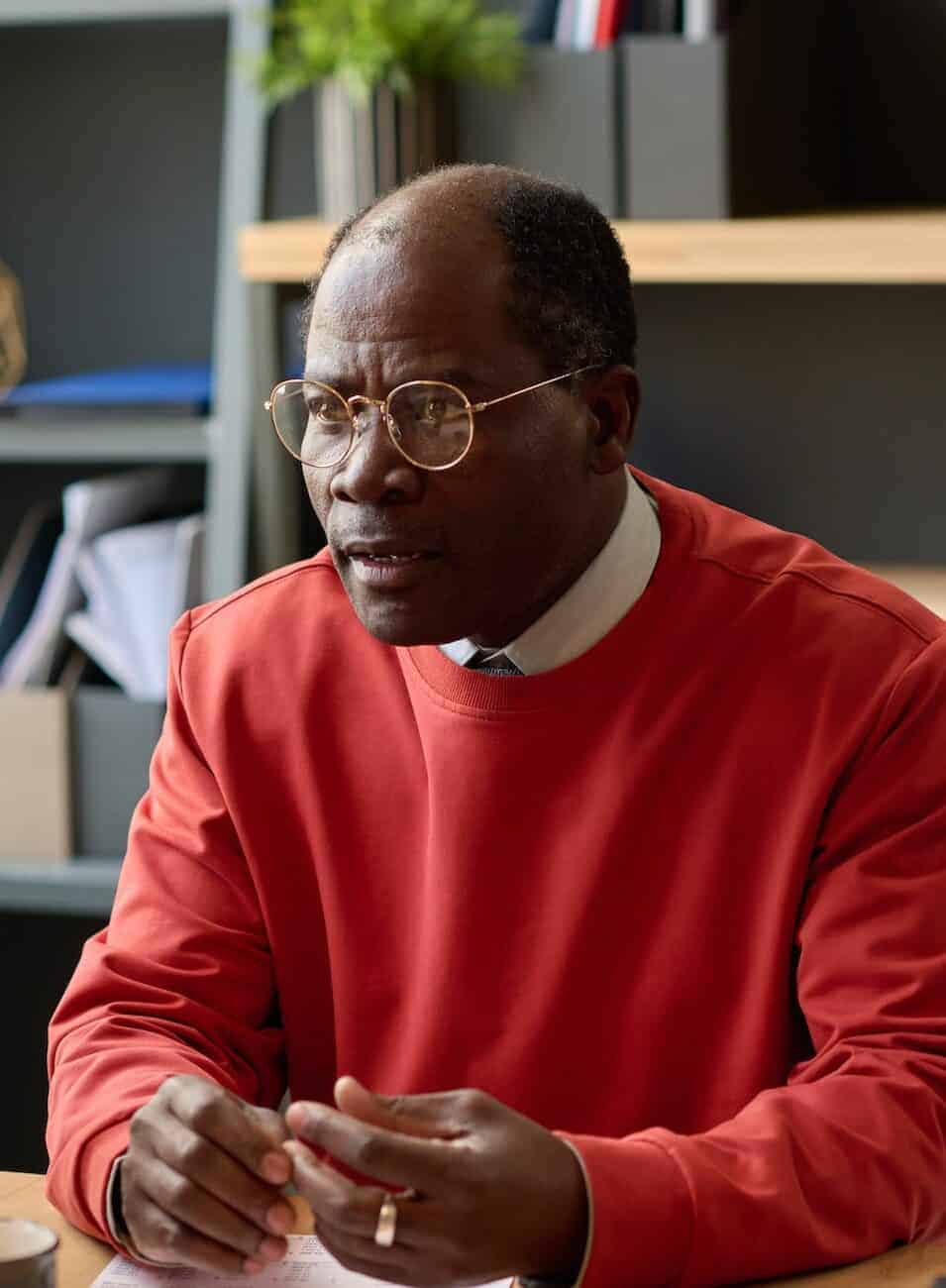 African businessman sitting at meeting