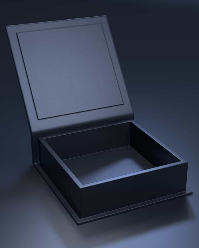 Black blank open cardboard box on a dark background. Mock up template.